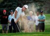 Australia's Richard Green hits out of the sand on the twelfth hole during second round of the PGA Tour Champions golf event in Calgary, Alta., Saturday, Aug. 17, 2024. THE CANADIAN PRESS/Jeff McIntosh