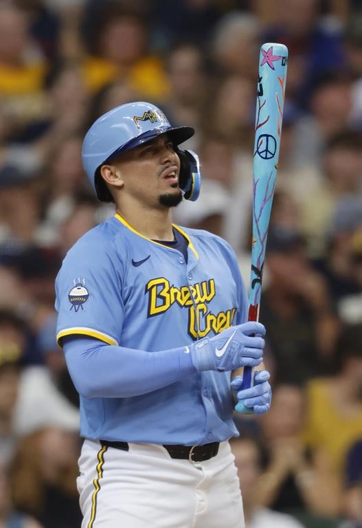 Milwaukee Brewers' Willy Adames bats against the Cleveland Guardians during the first inning of a baseball game Saturday, Aug. 17, 2024, in Milwaukee. (AP Photo/Jeffrey Phelps)
