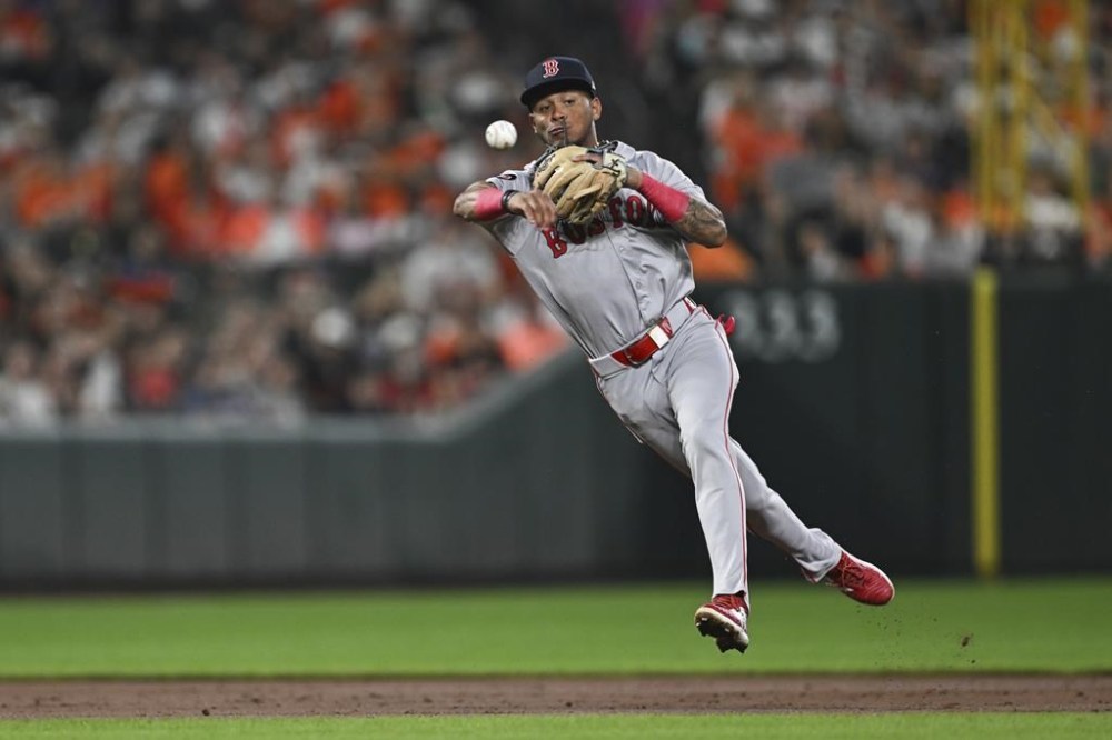 Boston Red Sox shortstop Ceddanne Rafaela throws out Baltimore Orioles' Ramón Urías at first during the second inning of baseball game, Saturday, Aug. 17, 2024, in Baltimore. (AP Photo/Terrance Williams)