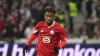 Lille's Angel Gomes runs with the ball during the Europa Conference League round of 16 second leg soccer match between Lille and Sturm Graz, at the Pierre Mauroy stadium in Villeneuve d'Ascq, northern France, March 14, 2024. (AP Photo/Matthieu Mirville)