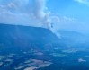 The Hullcar Mountain wildfire burns near Armstrong, B.C. in this Aug. 5, 2024 handout photo. Wet weather is helping firefighters in British Columbia tackle some of the wildfires burning in the south of the province. THE CANADIAN PRESS/HO, B.C. Wildfire Service *MANDATORY CREDIT*