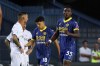 Hellas Verona's Daniel Mosquera, right, celebrates scoring during the Serie A soccer match between Hellas Verona and Napoli at the Marcantonio Bentegodi Stadium, Verona, Italy, Sunday Aug. 18, 2024. (Paola Garbuioi/LaPresse via AP)