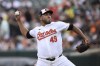 Baltimore Orioles starting pitcher Albert Suarez throws during the second inning of a baseball game against the Boston Red Sox, Sunday, Aug. 18, 2024, in Baltimore. (AP Photo/Nick Wass)