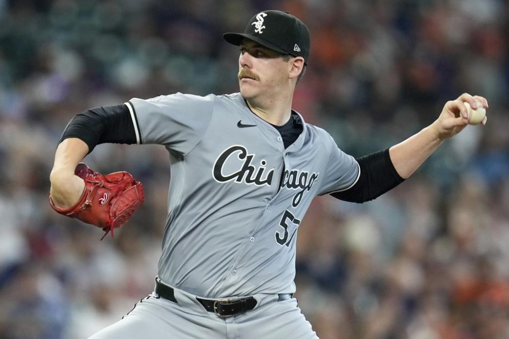 Chicago White Sox starting pitcher Ky Bush throws against the Houston Astros during the second inning of a baseball game Sunday, Aug. 18, 2024, in Houston. (AP Photo/Eric Christian Smith)