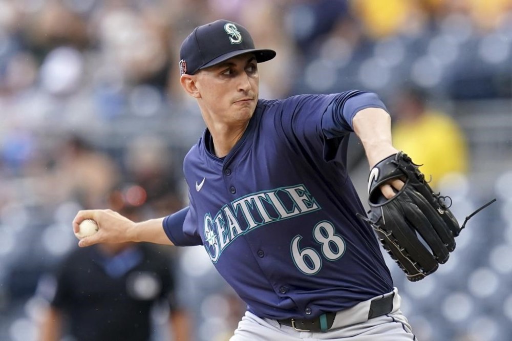 Seattle Mariners starting pitcher George Kirby delivers during the first inning of a baseball game against the Pittsburgh Pirates, Sunday, Aug. 18, 2024, in Pittsburgh. (AP Photo/Matt Freed)
