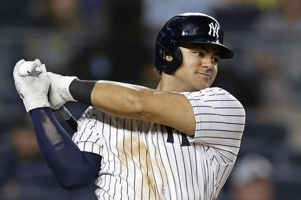 FILE - New York Yankees' Jasson Dominguez takes an at-bat against the Milwaukee Brewers during the eighth inning of a baseball game Sept. 8, 2023, in New York. (AP Photo/Adam Hunger, File)
