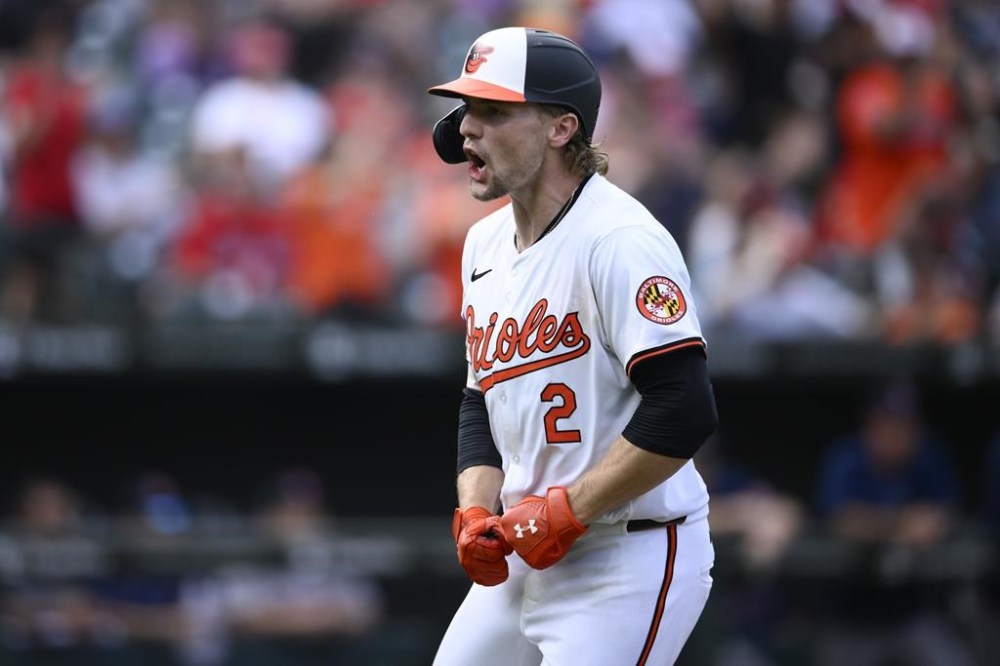 Baltimore Orioles' Gunnar Henderson reacts towards the dugout after he hit a two-run home run during the sixth inning of a baseball game against the Boston Red Sox, Sunday, Aug. 18, 2024, in Baltimore. (AP Photo/Nick Wass)