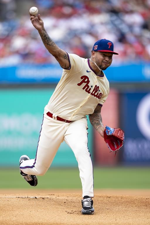Philadelphia Phillies starting pitcher Taijuan Walker delivers during the first inning of a baseball game against the Washington Nationals, Sunday, Aug. 18, 2024, in Philadelphia. (AP Photo/Chris Szagola)