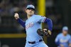 Texas Rangers starting pitcher Tyler Mahle throws to the Minnesota Twins in the first inning of a baseball game, Sunday, Aug. 18, 2024, in Arlington, Texas. (AP Photo/Tony Gutierrez)