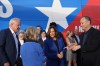Second gentleman Doug Emhoff, from right, Democratic presidential nominee Vice President Kamala Harris, Gwen Walz and her husband Democratic vice presidential nominee Minnesota Gov. Tim Walz arrive on a campaign bus at Pittsburgh International Airport, Sunday, Aug. 18, 2024, in Pittsburgh. THE CANADIAN PRESS/AP-Julia Nikhinson