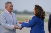 Democratic presidential nominee Vice President Kamala Harris, right is greeted on the tarmac by Sen. Dick Durbin, D-Il., left, after arriving at O'Hare International Airport in Chicago on Sunday, Aug. 18, 2024. (AP Photo/Brynn Anderson)