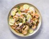 This image released by Milk Street shows a recipe for drunken shrimp with tequila (Camarones Borrachos). (Milk Street via AP)
