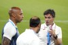 Spain's head coach Santi Denia, right, and France's head coach Thierry Henry stand together after the men's soccer gold medal at the Parc des Princes during the 2024 Summer Olympics, Friday, Aug. 9, 2024, in Paris, France. (AP Photo/Francisco Seco)
