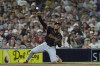 Pittsburgh Pirates third baseman Ke'Bryan Hayes throws from his knees to first too late as San Diego Padres' Bryce Johnson arrives safely for a single during the eighth inning of a baseball game Monday, Aug. 12, 2024, in San Diego. (AP Photo/Gregory Bull)