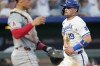 Kansas City Royals' Michael Massey (19) runs home to score on a single by Salvador Perez during the third inning of a baseball game against the Los Angeles Angels Monday, Aug. 19, 2024, in Kansas City, Mo. (AP Photo/Charlie Riedel)