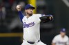 Texas Rangers starting pitcher Dane Dunning throws to the Pittsburgh Pirates in the first inning of a baseball game, Monday, Aug. 19, 2024, in Arlington, Texas. (AP Photo/Tony Gutierrez)