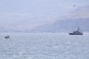 Emergency services at the scene of the search for a missing boat, in Porticello Santa Flavia, Italy, Monday, Aug. 19, 2024. British tech giant Mike Lynch, his lawyer and four other people are among those missing after their luxury superyacht sank during a freak storm off Sicily, Italy’s civil protection and authorities said. Lynch’s wife and 14 other people survived. (Alberto Lo Bianco /LaPresse via AP)
