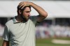 Scottie Scheffler walks off the 18th green after the final round of the St. Jude Championship golf tournament Sunday, Aug. 18, 2024, in Memphis, Tenn. (AP Photo/Mark Humphrey)