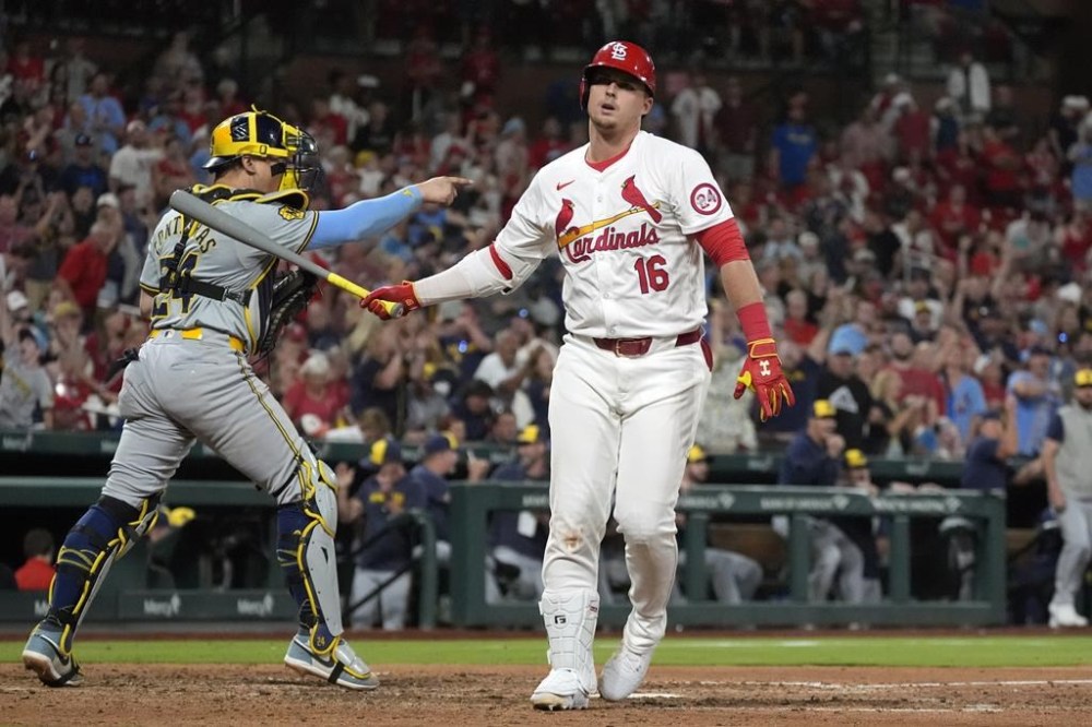 Milwaukee Brewers catcher William Contreras, left, celebrates after St. Louis Cardinals' Nolan Gorman (16) struck out with the bases loaded for the final out of a baseball game Tuesday, Aug. 20, 2024, in St. Louis. (AP Photo/Jeff Roberson)