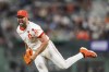 San Francisco Giants pitcher Robbie Ray reacts after throwing during the seventh inning of a baseball game against the Chicago White Sox in San Francisco, Tuesday, Aug. 20, 2024. (AP Photo/Nic Coury)