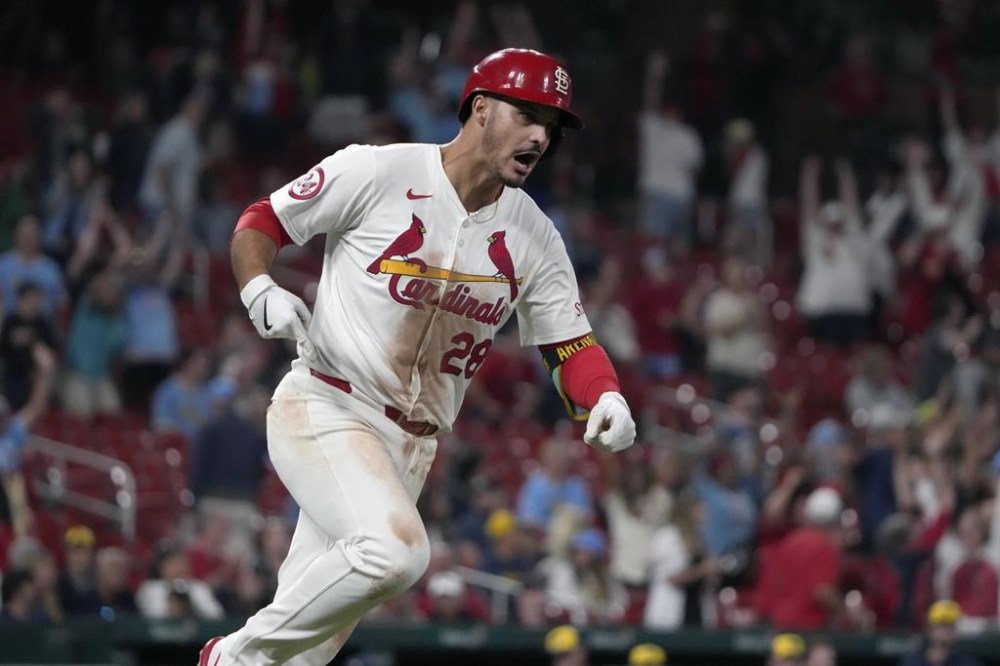 St. Louis Cardinals' Nolan Arenado celebrates as he rounds the bases after hitting a walk-off grand slam to defeat the Milwaukee Brewers 10-6 in a baseball game Wednesday, Aug. 21, 2024, in St. Louis. (AP Photo/Jeff Roberson)