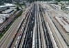 Rail and tanker cars and shipping containers sit idle at the Canadian Pacific Kansas City (CPKC) rail yard in Port Coquitlam, B.C., Monday, Aug. 19, 2024. THE CANADIAN PRESS/Darryl Dyck