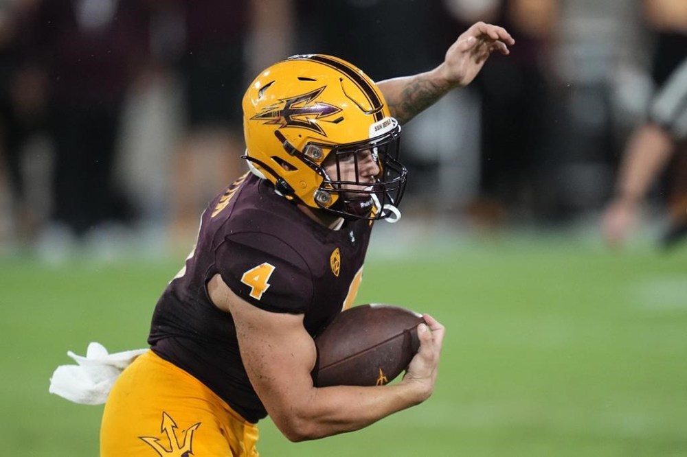 Arizona State running back Cameron Skattebo runs with the ball during the second half of an NCAA college football game against Southern Utah Friday, Sept. 1, 2023, in Tempe, Ariz. (AP Photo/Ross D. Franklin, File)