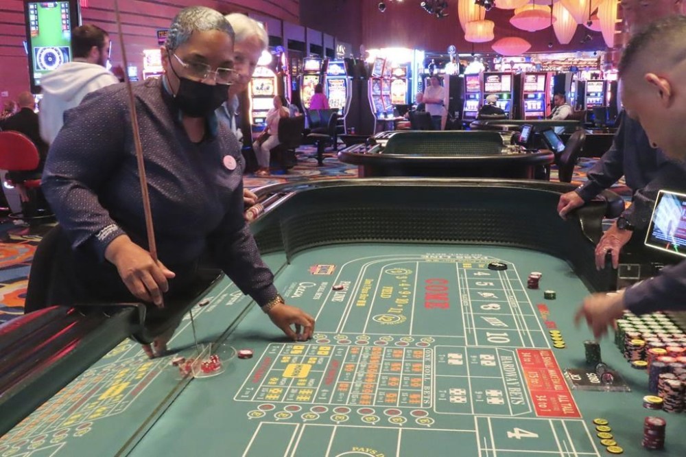 Dealers conduct a game of craps at the Ocean Casino Resort in Atlantic City, N.J., on May 21, 2024. (AP Photo/Wayne Parry)