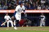 Toronto Blue Jays third baseman Ernie Clement (28) hits a two run home run against the Los Angeles Angels during first inning MLB baseball action in Toronto on Thursday, Aug 22, 2024. THE CANADIAN PRESS/Jon Blacker