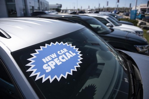 Statistics Canada says retail sales fell 0.3 per cent to $65.7 billion in June as sales dropped at new car dealers. A new vehicle for sale is seen at an auto mall in Ottawa, on Monday, April 26, 2021. THE CANADIAN PRESS/Justin Tang