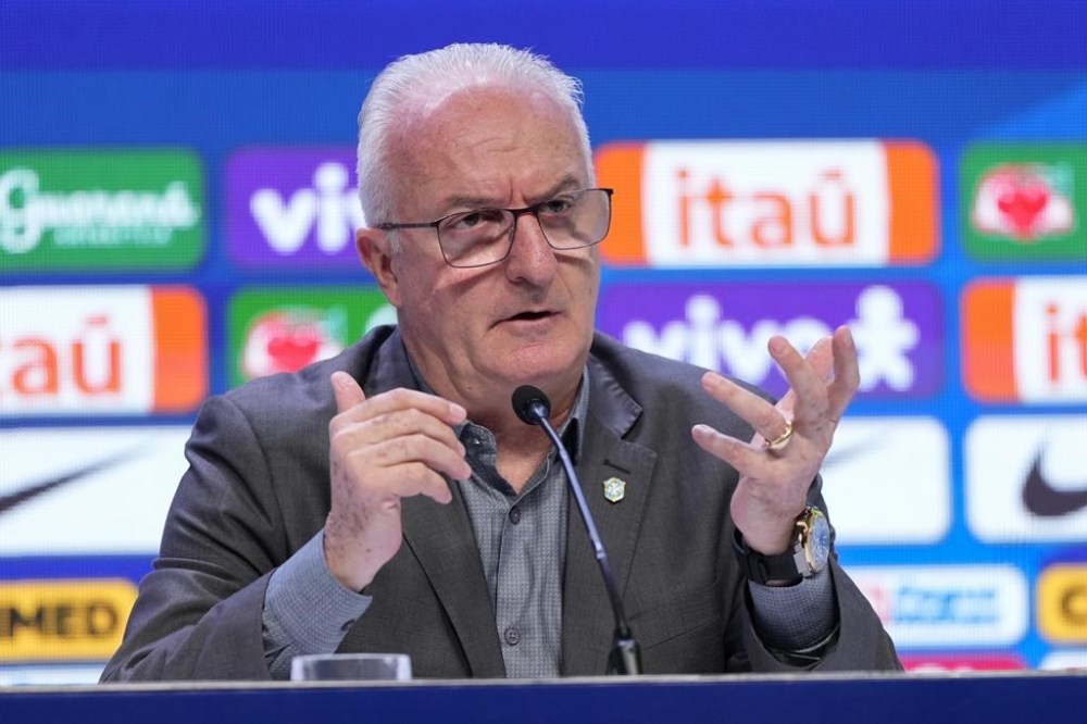 Brazil's soccer coach Dorival Junior announces the players who will compete in the World Cup 2026 qualifiers against Ecuador and Paraguay in Rio de Janeiro, Friday, Aug. 23, 2024. (AP Photo/Silvia Izquierdo).