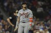 Detroit Tigers' Javier Báez walks back to the dugout after striking out for the third time during the seventh inning of a baseball game against the Chicago Cubs Tuesday, Aug. 20, 2024, in Chicago. (AP Photo/Melissa Tamez)