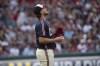 Cleveland Guardians starter Tanner Bibee pauses between pitches during the second inning of a baseball game against the Texas Rangers in Cleveland, Friday, Aug. 23, 2024. (AP Photo/Phil Long)