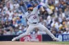 New York Mets starting pitcher Paul Blackburn works against a San Diego Padres batter during the first inning of a baseball game Friday, Aug. 23, 2024, in San Diego. (AP Photo/Gregory Bull)