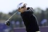Korea's Jiyai Shin plays her shot at the 4th tee during the third round of the Women's British Open golf championship, in St Andrews, Scotland Saturday, Aug. 24, 2024. (AP Photo/Scott Heppell)