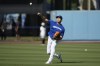 Los Angeles Dodgers designated hitter Shohei Ohtani works out before a baseball game against the Tampa Bay Rays in Los Angeles, Saturday, Aug. 24, 2024. (AP Photo/Ashley Landis)