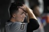 Detroit Tigers starting pitcher Tarik Skubal looks out from dugout after completing the fifth inning of a baseball game against the Chicago White Sox on Saturday, Aug. 24, 2024, in Chicago. (AP Photo/Charles Rex Arbogast)