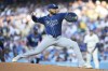 Tampa Bay Rays center fielder Jonny DeLuca throws during the first inning of a baseball game against the Los Angeles Dodgers in Los Angeles, Saturday, Aug. 24, 2024. (AP Photo/Ashley Landis)