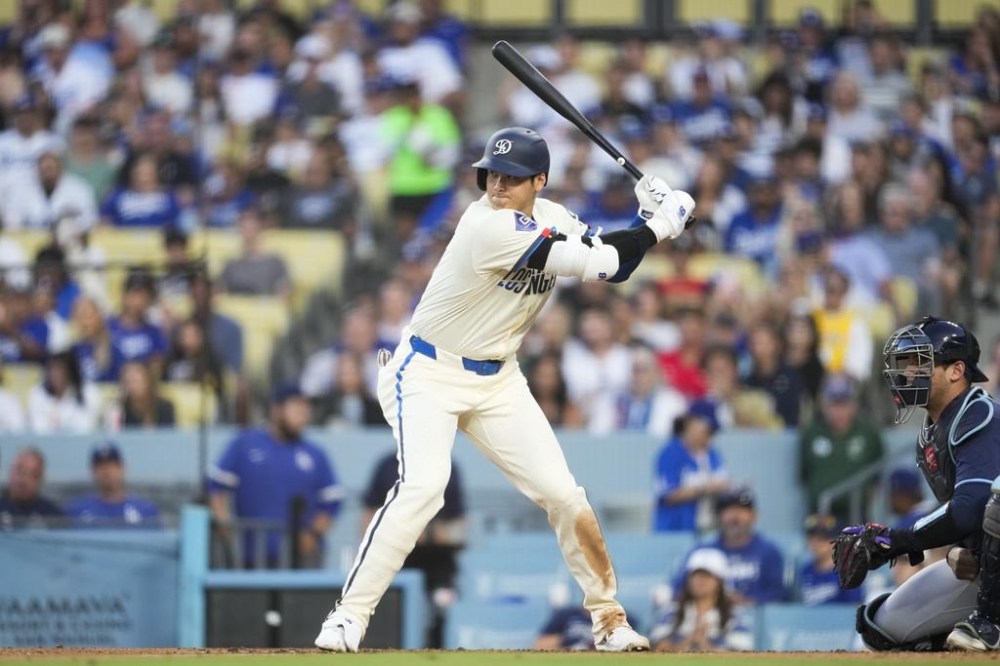 Los Angeles Dodgers designated hitter Shohei Ohtani waits for a pitch during the fourth inning of a baseball game against the Tampa Bay Rays in Los Angeles, Saturday, Aug. 24, 2024. (AP Photo/Ashley Landis)