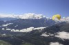 This photo provide by Waldrappteam Conservation & Research shows the migration from Northern Bald Ibis, or the Waldrapp, supported by foster parents of the birds in a microlight aircraft, waving and shouting encouragement through a bullhorn as it flies through the air from Seekirchen am Wallersee in Austria to Oasi Laguna di Orbetello in Italy during August and September 2022. (Waldrappteam Conservation & Research via AP)