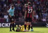 Referee David Coote checks on Bournemouth goalkeeper Neto during the Premier League match between Bournemouth and Newcastle United at the Vitality Stadium, Bournemouth, England, Sunday, Aug. 25, 2024. (John Walton/PA via AP)