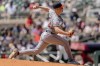 Washington Nationals pitcher DJ Herz throws in the third inning of a baseball game against the Atlanta Braves, Sunday, Aug. 25, 2024, in Atlanta. (AP Photo/Jason Allen)