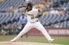 Pittsburgh Pirates starting pitcher Luis Ortiz delivers during the first inning of a baseball game against the Cincinnati Reds, Sunday, Aug. 25, 2024, in Pittsburgh. (AP Photo/Matt Freed)