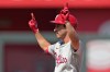 Philadelphia Phillies' Garrett Stubbs celebrates on second after hitting an RBI double during the sixth inning of a baseball game against the Kansas City Royals Sunday, Aug. 25, 2024, in Kansas City, Mo. (AP Photo/Charlie Riedel)