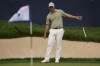 Adam Scott, of Australia, reacts after missing a putt attempt on the 16th green during the final round of the BMW Championship golf event at Castle Pines Golf Club, Sunday, Aug. 25, 2024, in Castle Rock, Colo. (AP Photo/Matt York)