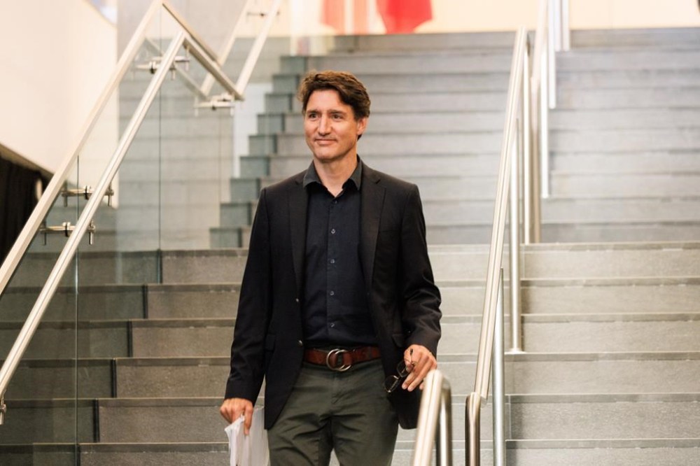 Prime Minister Justin Trudeau arrives to the Sunday evening cabinet retreat dinner at the Halifax Convention Centre on Sunday Aug. 25, 2024. THE CANADIAN PRESS/Kelly Clark