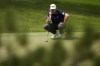 Taylor Pendrith, of Canada, lines up a putt on the sixth green during the final round of the BMW Championship golf event at Castle Pines Golf Club, Sunday, Aug. 25, 2024, in Castle Rock, Colo. (AP Photo/Matt York)