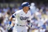 Los Angeles Dodgers' Kiké Hernández runs the bases after hitting a home run during the fifth inning of a baseball game Tampa Bay Rays in Los Angeles, Sunday, Aug. 25, 2024. (AP Photo/Ashley Landis)