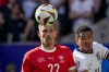 FILE - Switzerland's Fabian Schar, left, vies for the ball with England's Jude Bellingham during the quarterfinal soccer match between England and Switzerland at the Euro 2024 soccer tournament in Duesseldorf, Germany, Saturday, July 6, 2024. (AP Photo/Frank Augstein, File)