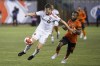 Hamilton's Forge FC holds a seemingly comfortable 2-1 lead on aggregate heading into the second leg of the Canadian Championship semifinal on Tuesday night. Toronto FC defender Kevin Long (5) battles for a ball with Forge FC forward Beni Badibanga (39) during second half Canadian Championship semifinal action in Hamilton, Ont., on Wednesday, July 10, 2024. THE CANADIAN PRESS/Nick Iwanyshyn